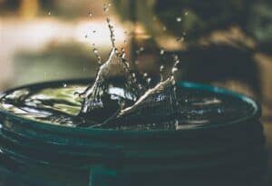 water dripping and splashing into a container.