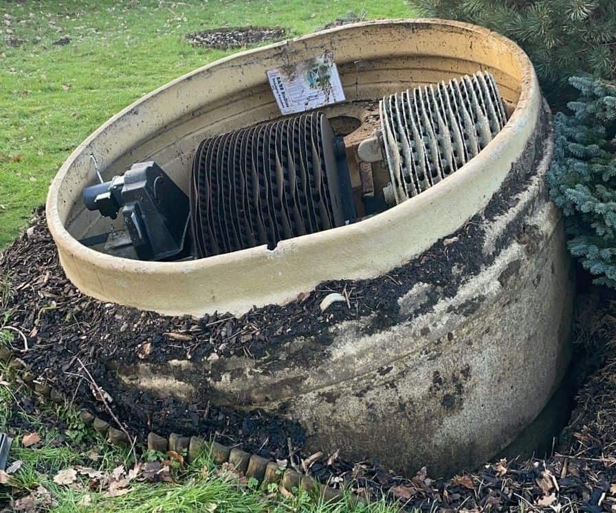 Broken sewage treatment plant uprooted from the ground by heavy rain - UK weather and Local Flooding