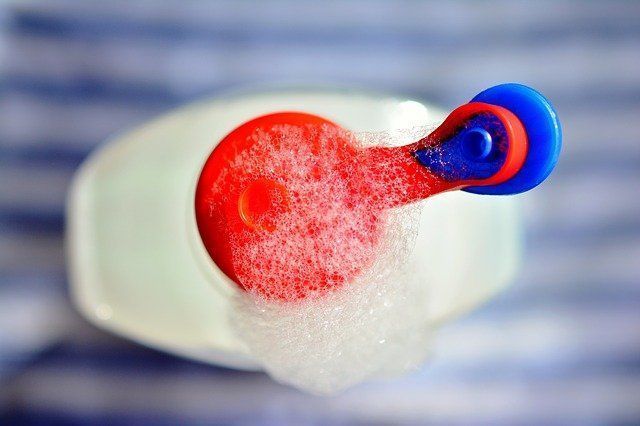 Detergent bottles in raw sewage